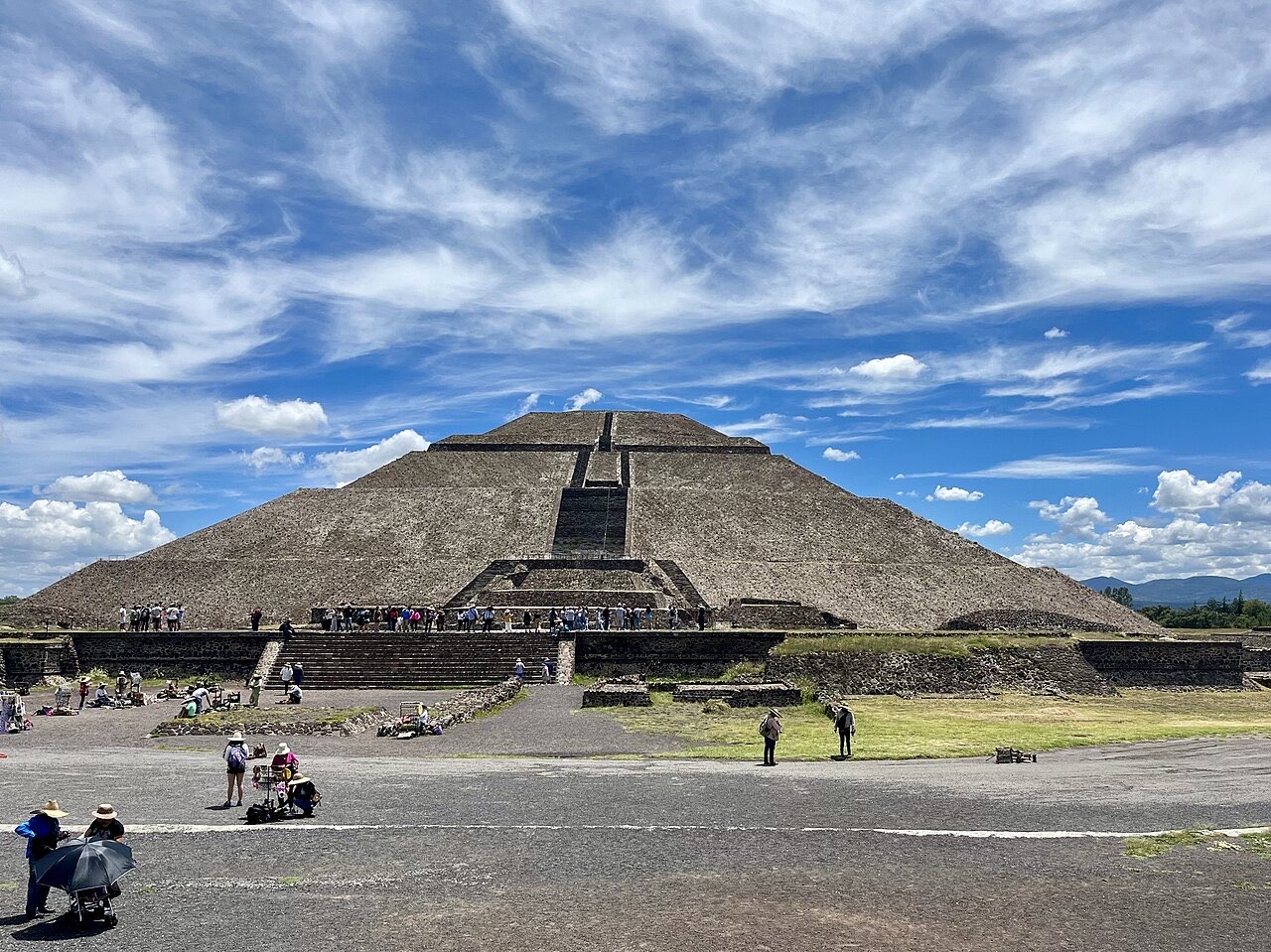 The Pyramid of the Sun at Teotihuacan under a blue sky